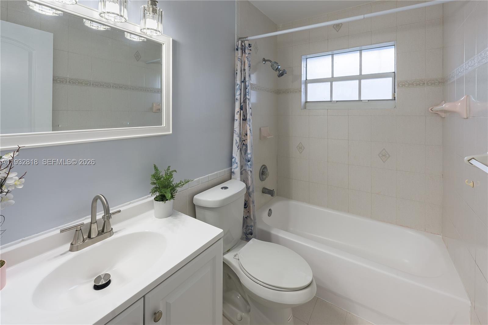 13797 Southwest 154th Street Miami, FL 33177 - Photo 18 of 22 a bathroom with a sink toilet and shower