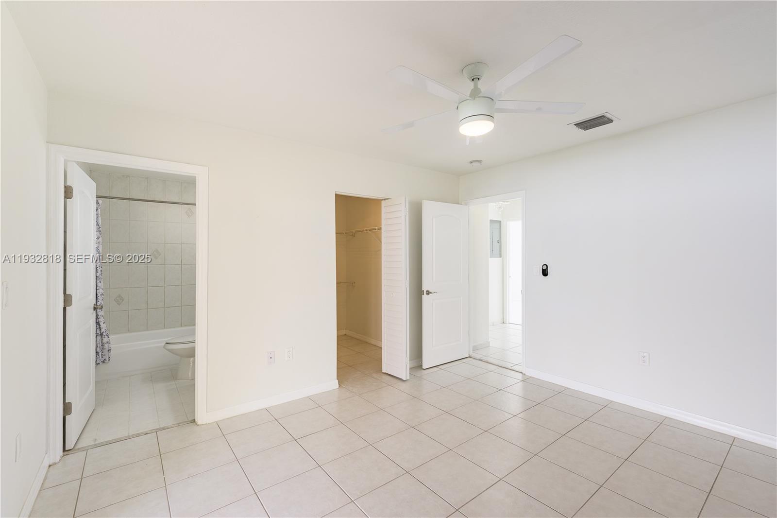 13797 Southwest 154th Street Miami, FL 33177 - Photo 10 of 14 a view of an empty room
