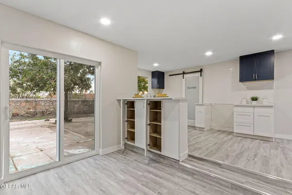 a room with furniture and a window