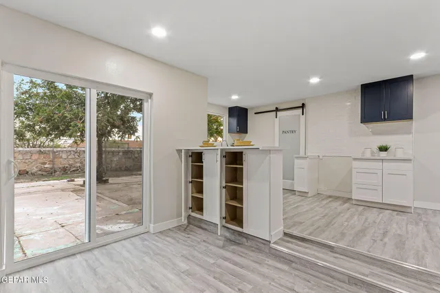 a room with furniture and a window