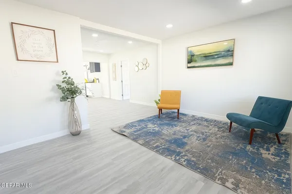 a bathroom with a sink and a window