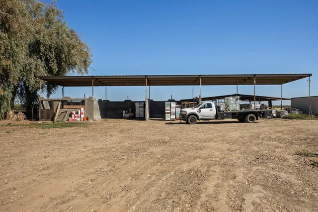 a view of street with parked cars