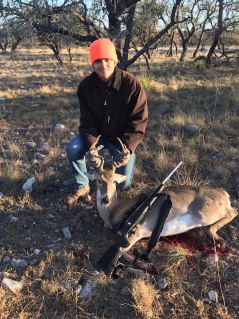 1445 Cave Wells Road, Unit 15 Fort McKavett, TX 76841 - Photo 10 of 11 a backyard of a house with table and chairs