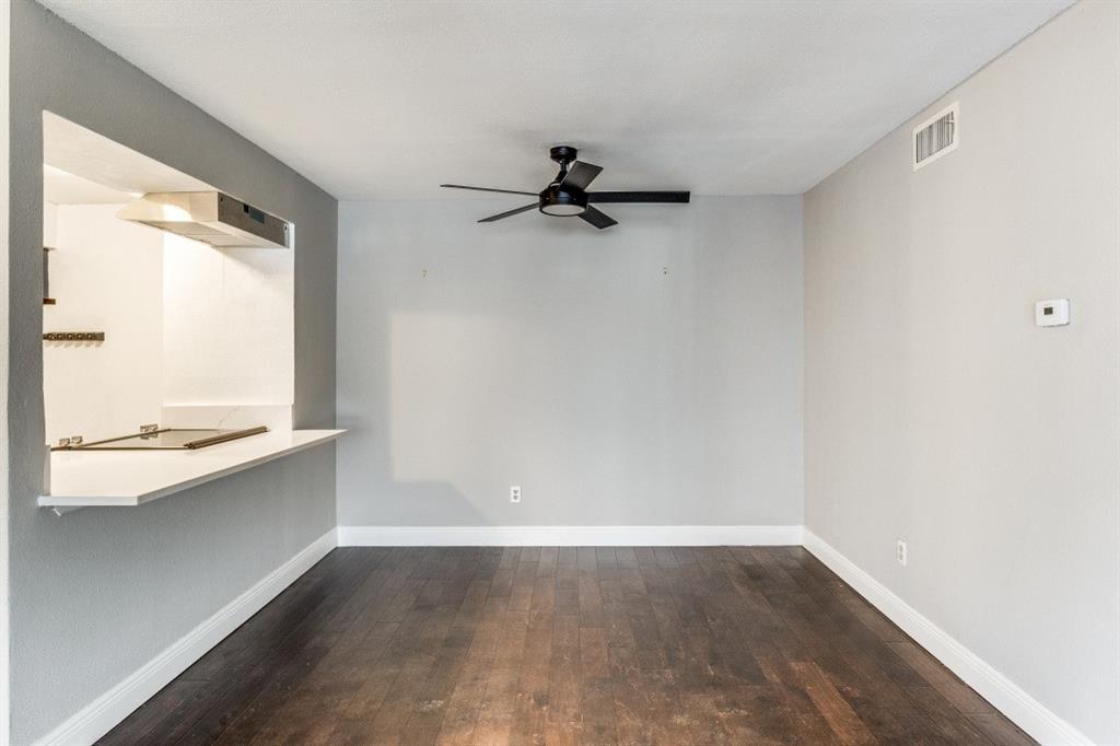 8110 Skillman Street, Unit 2019 Dallas, TX 75231 - Photo 7 of 13 a view of a kitchen with a sink and a window