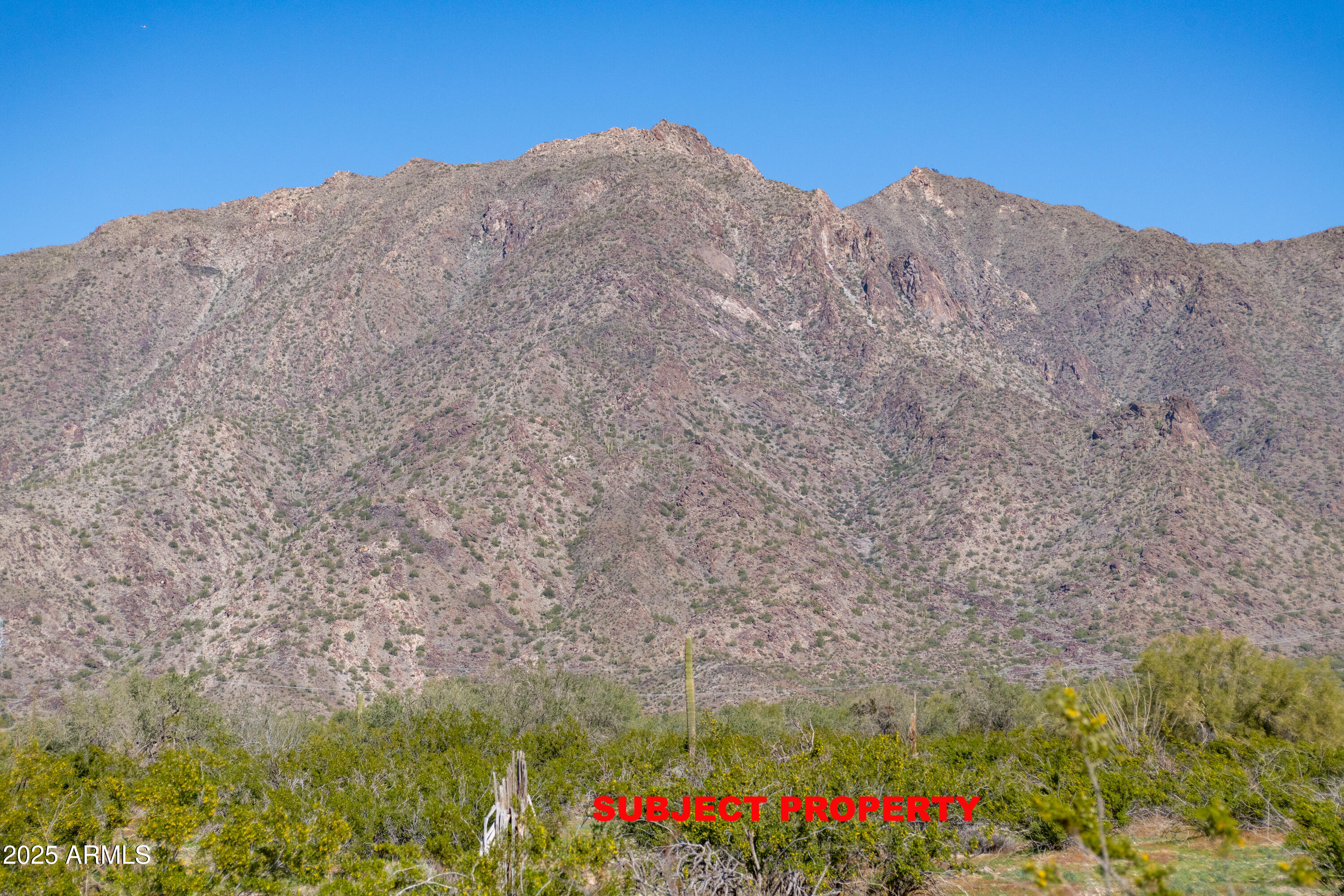 2-acres East 2-acres E Ocotillo (no Address) Road Laveen, AZ 85339 - Photo 2 of 25 a view of a large mountain with mountains in the background