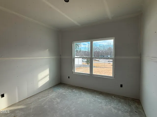 a view of a hallway with windows