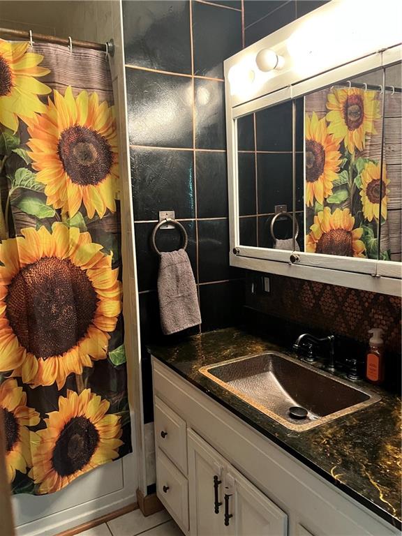 161 Freeport Road Butler, PA 16002 - Photo 11 of 24 a bathroom with a granite countertop sink and mirror