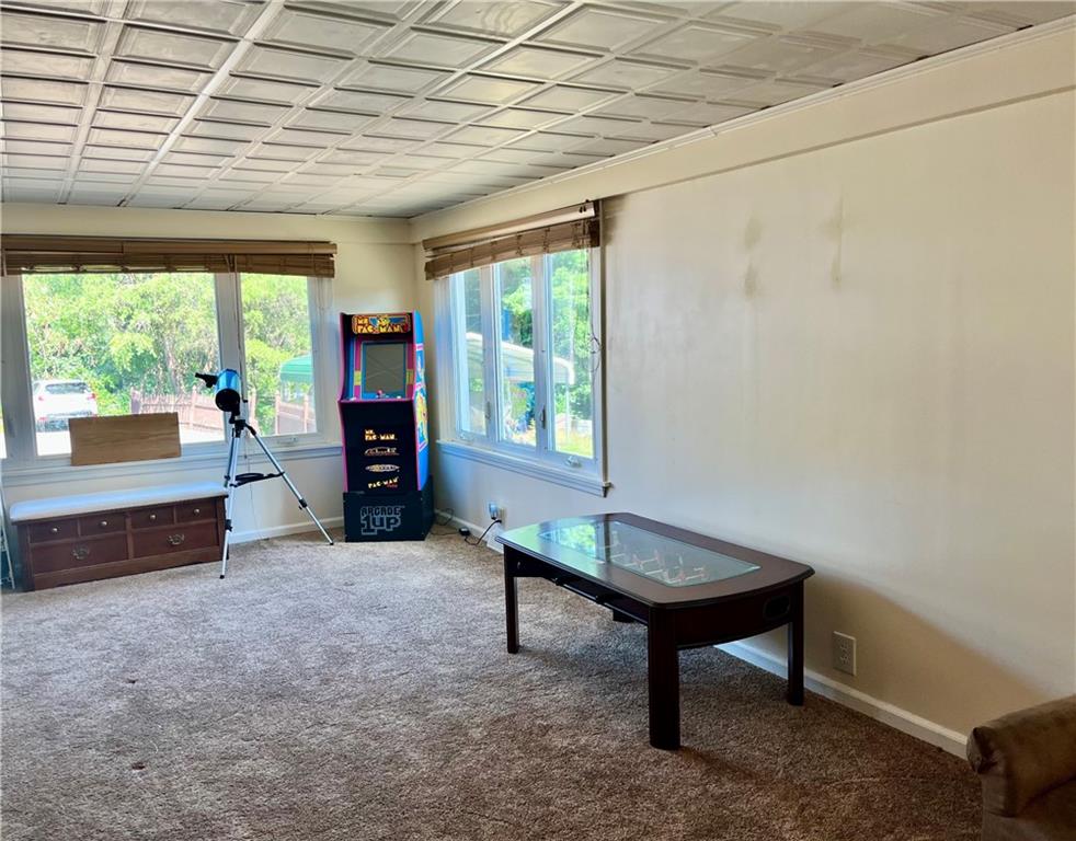 161 Freeport Road Butler, PA 16002 - Photo 13 of 24 a room with furniture and a window