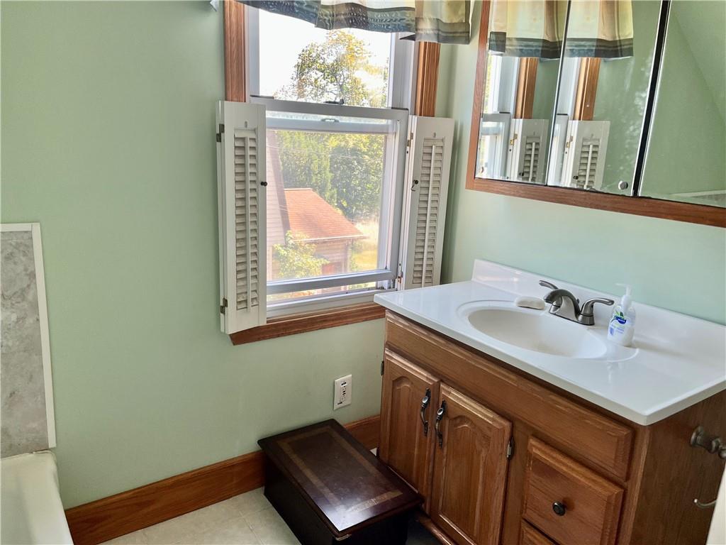 161 Freeport Road Butler, PA 16002 - Photo 16 of 24 a bathroom with a sink and a window