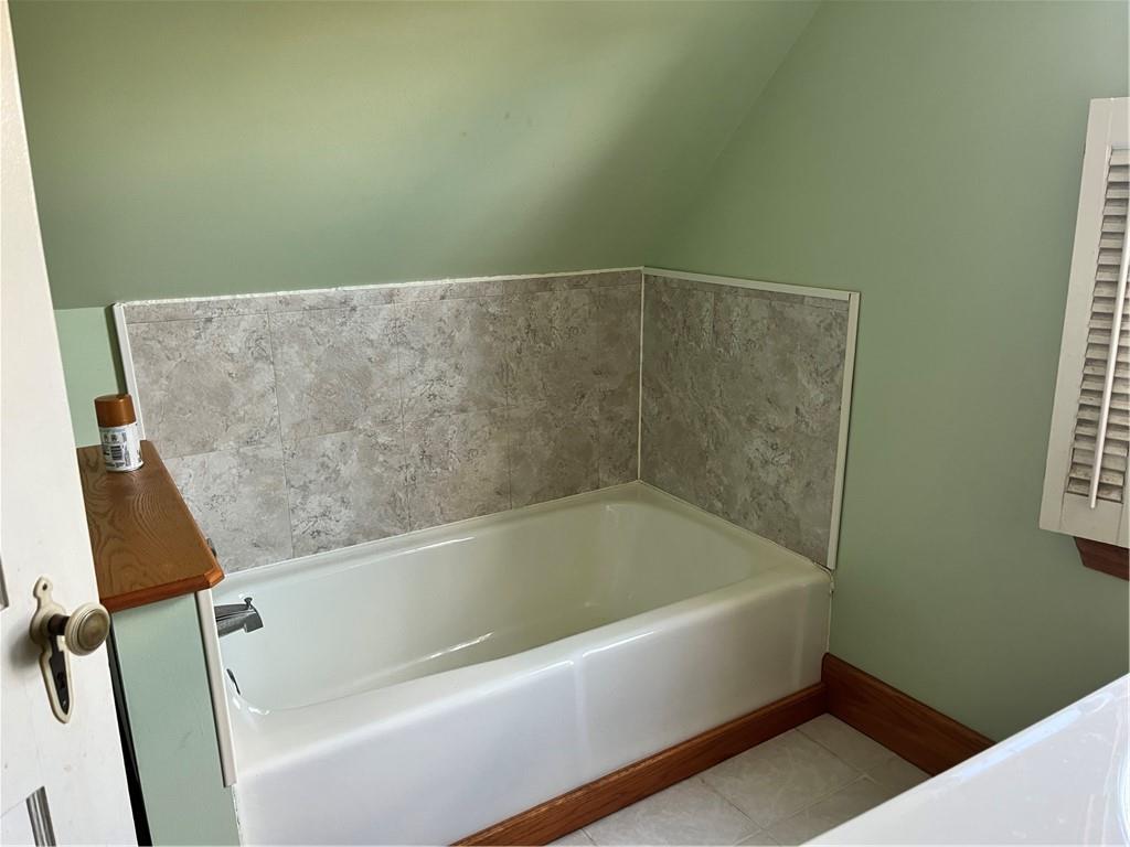 161 Freeport Road Butler, PA 16002 - Photo 17 of 24 a view of a bath tub sitting in a bathroom