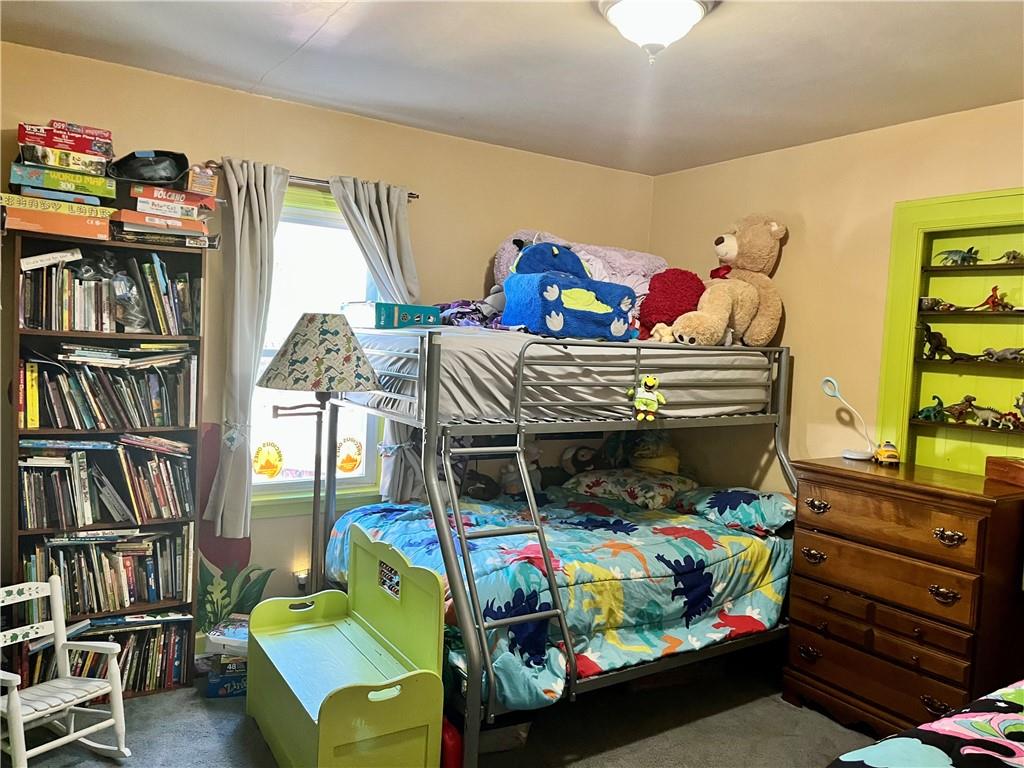 161 Freeport Road Butler, PA 16002 - Photo 23 of 24 a bed room with furniture and a book shelf
