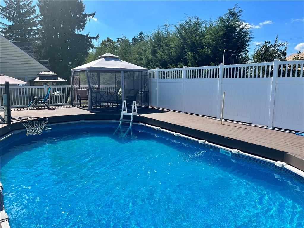 161 Freeport Road Butler, PA 16002 - Photo 6 of 24 a backyard of a house with table and chairs