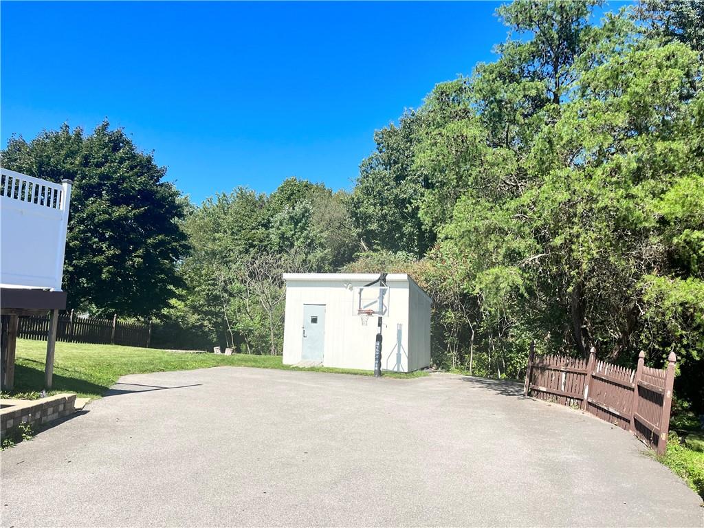161 Freeport Road Butler, PA 16002 - Photo 8 of 24 a view of a house with a yard and garage