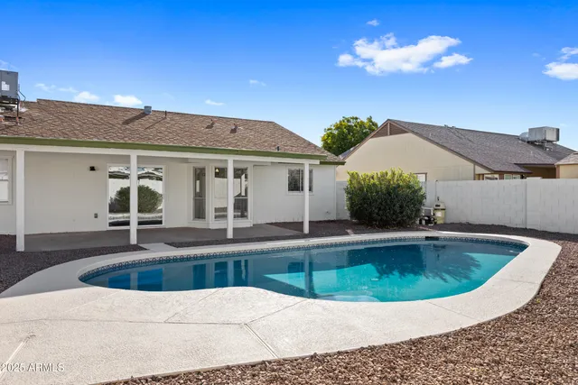 a view of outdoor space yard and swimming pool
