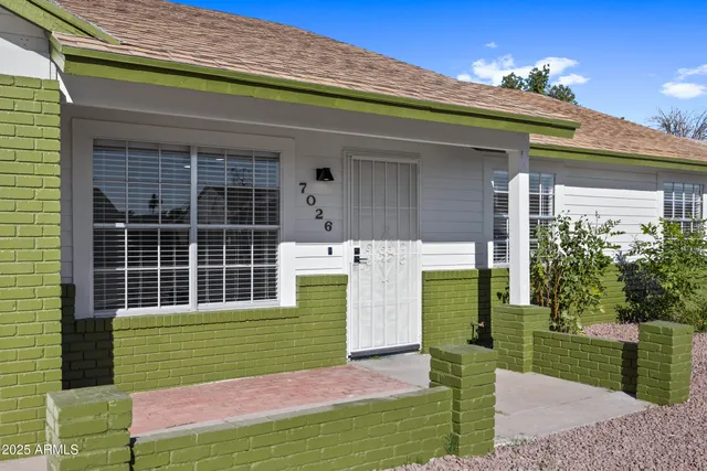 a view of a house with a swimming pool