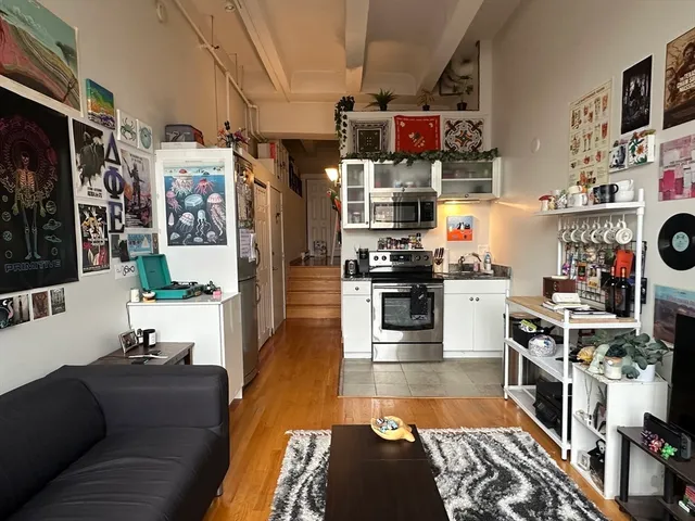 a bedroom with a bed and closet