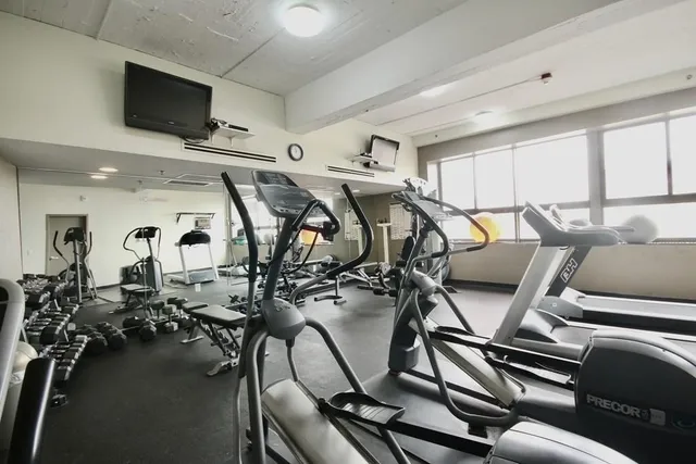 a view of a room with gym equipment