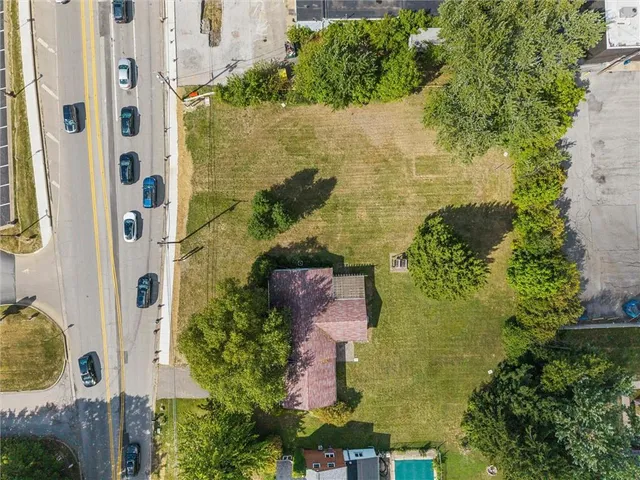 an aerial view of residential house with outdoor space