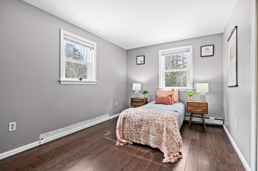 64 Gardner Road Winchendon, MA 01475 - Photo 14 of 40 a bedroom with a bed and wooden floor