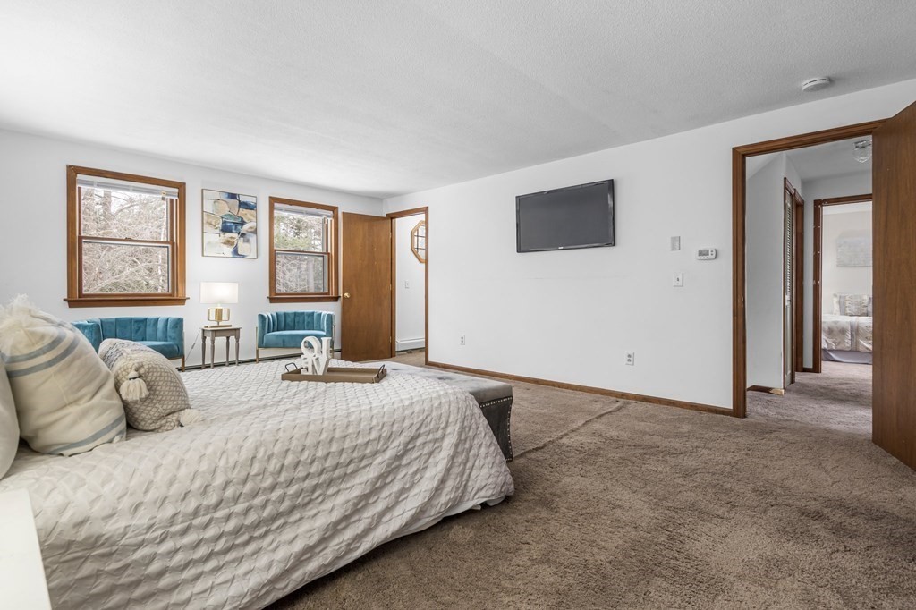 64 Gardner Road Winchendon, MA 01475 - Photo 18 of 40 a bedroom with a large bed and a window