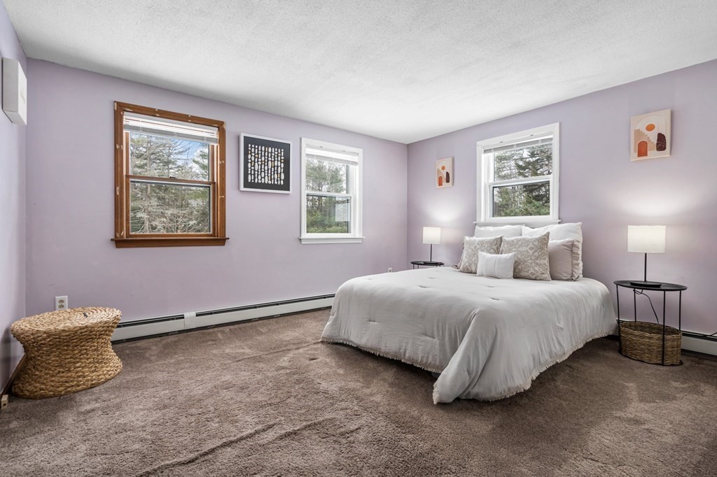 64 Gardner Road Winchendon, MA 01475 - Photo 20 of 40 a bedroom with a bed and lamp