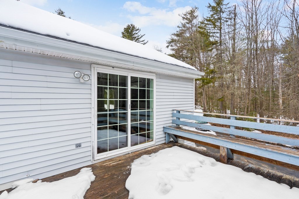64 Gardner Road Winchendon, MA 01475 - Photo 35 of 40 a view of a backyard with a large tree