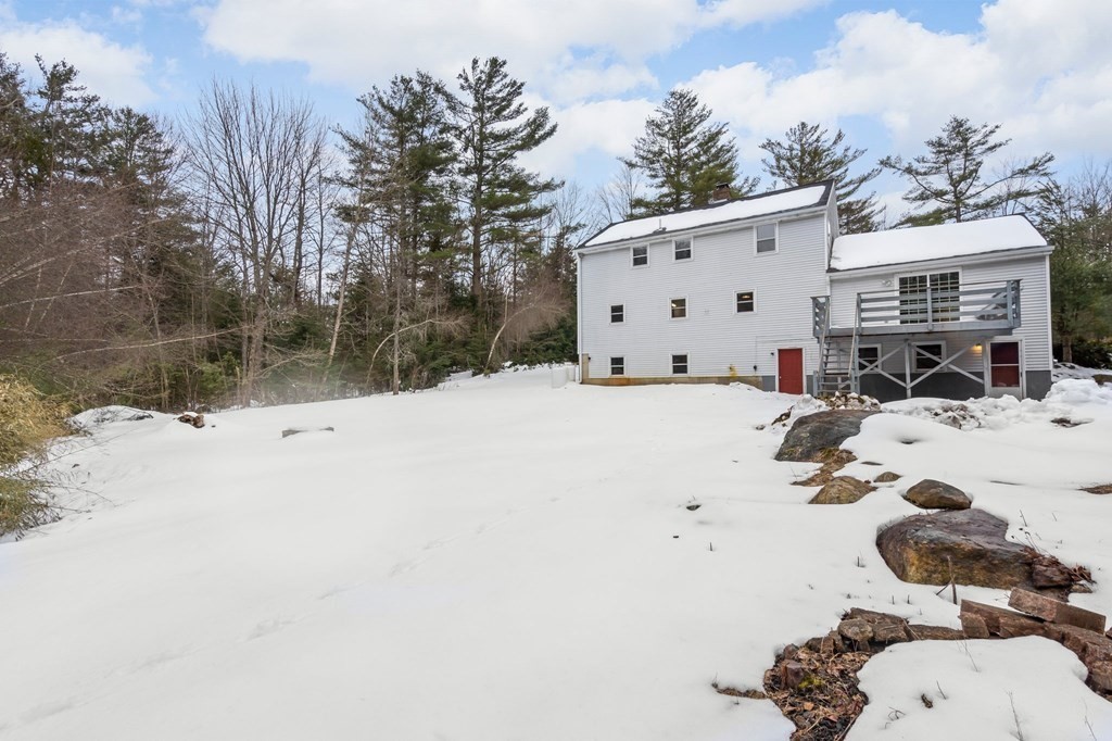 64 Gardner Road Winchendon, MA 01475 - Photo 37 of 40 a view of backyard with a snow on the road