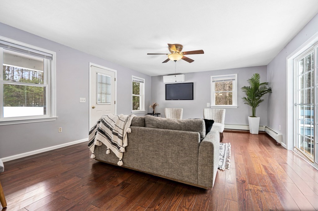 64 Gardner Road Winchendon, MA 01475 - Photo 10 of 40 a living room with furniture and a wooden floor