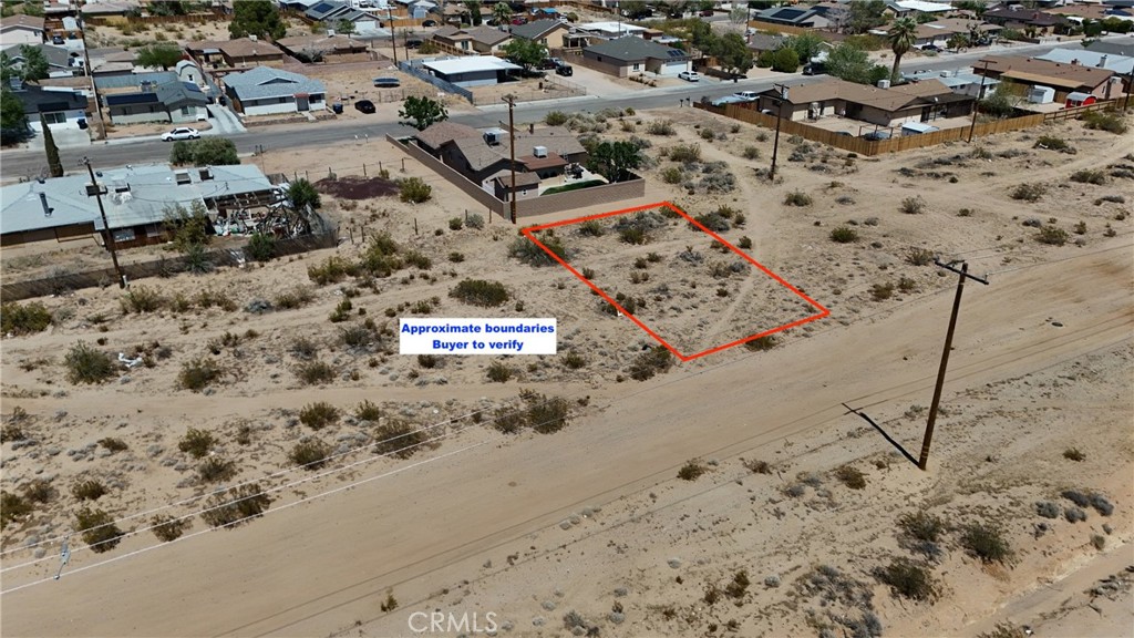 744 West Bowman (near) Road Ridgecrest, CA 93555 - Photo 2 of 9 an aerial view of a beach with parking space