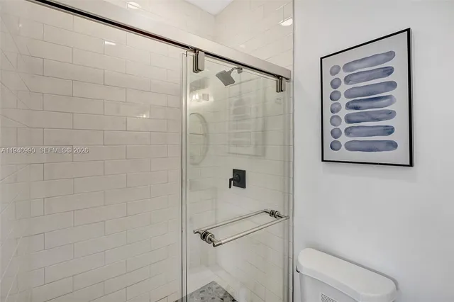 a view of a house with backyard porch and sitting area
