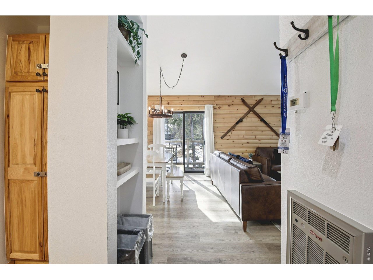 1937 Soda Ridge Road, Unit 1146 Dillon, CO 80435 - Photo 15 of 30 a living room with furniture a flat screen tv and a wooden floor