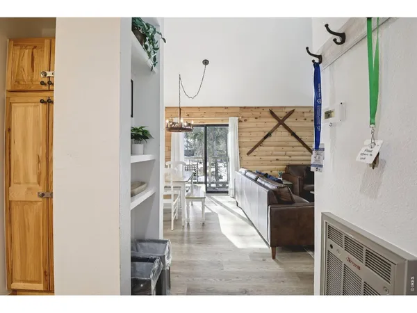 a view of living room with furniture and window