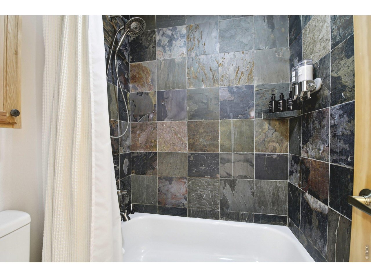 1937 Soda Ridge Road, Unit 1146 Dillon, CO 80435 - Photo 22 of 30 a bathroom with a shower