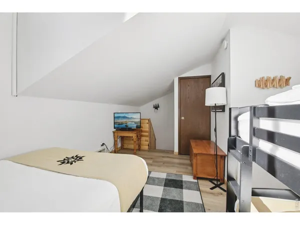 a view of a balcony with trees