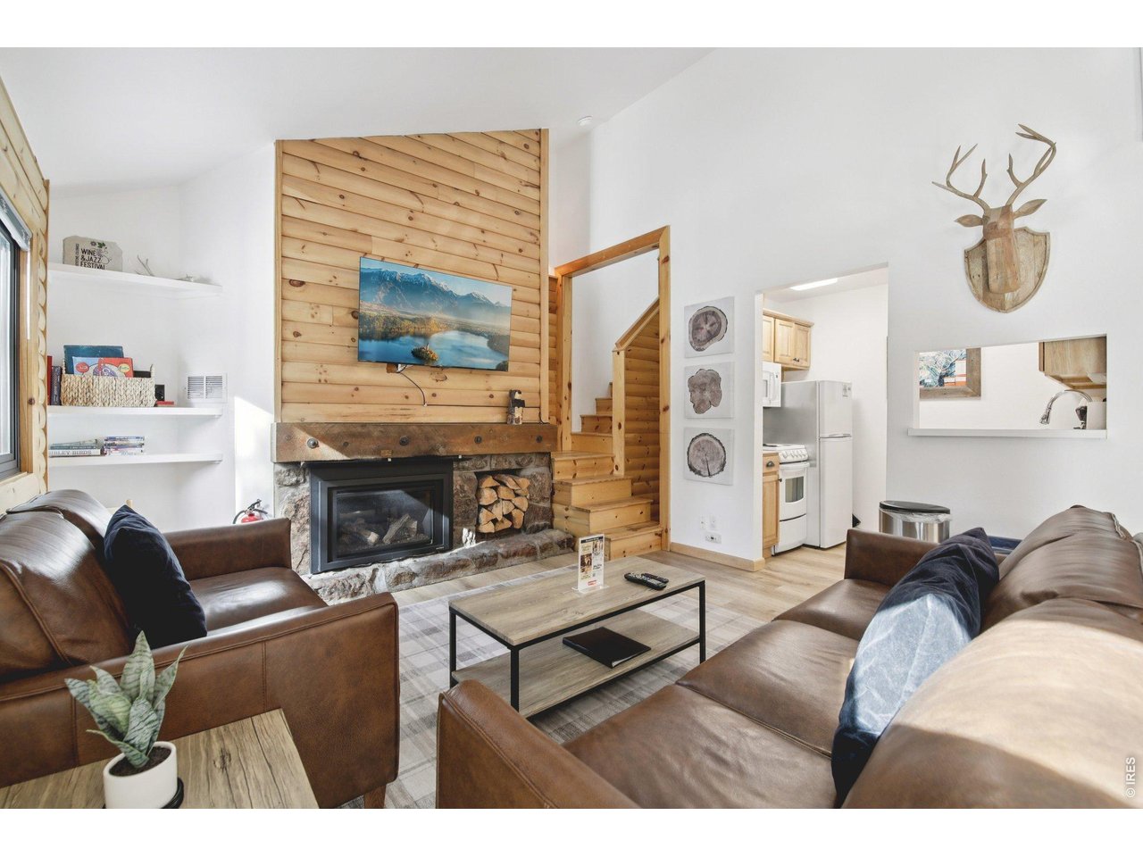 1937 Soda Ridge Road, Unit 1146 Dillon, CO 80435 - Photo 8 of 30 a living room with furniture and a fireplace