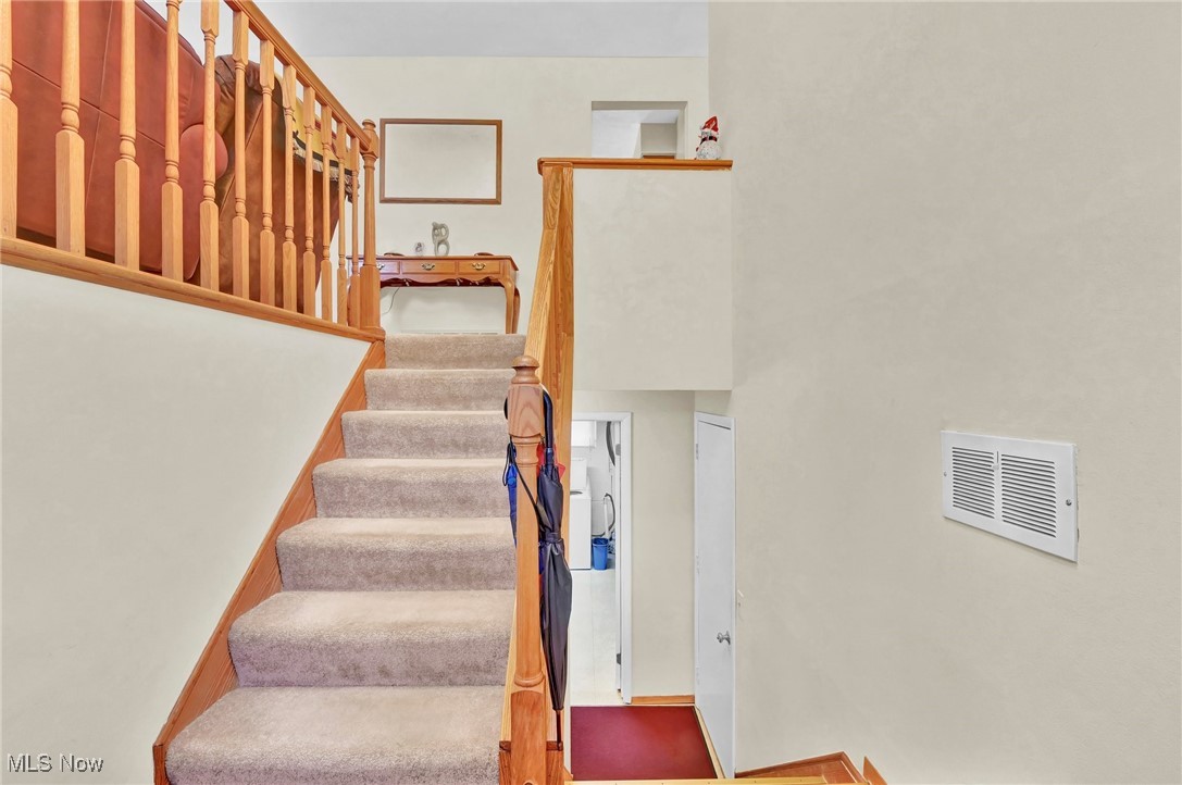 7676 Brecksville Road Independence, OH 44131 - Photo 18 of 32 Stairs featuring visible vents