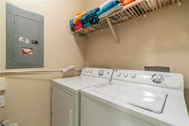 a utility room with dryer and washer
