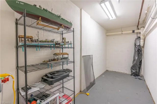 a front view of a house with a yard and outdoor seating