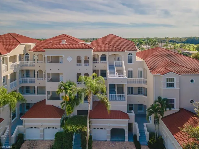 an aerial view of lake residential houses with outdoor space and river