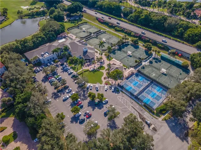 an aerial view of a house with a lake view