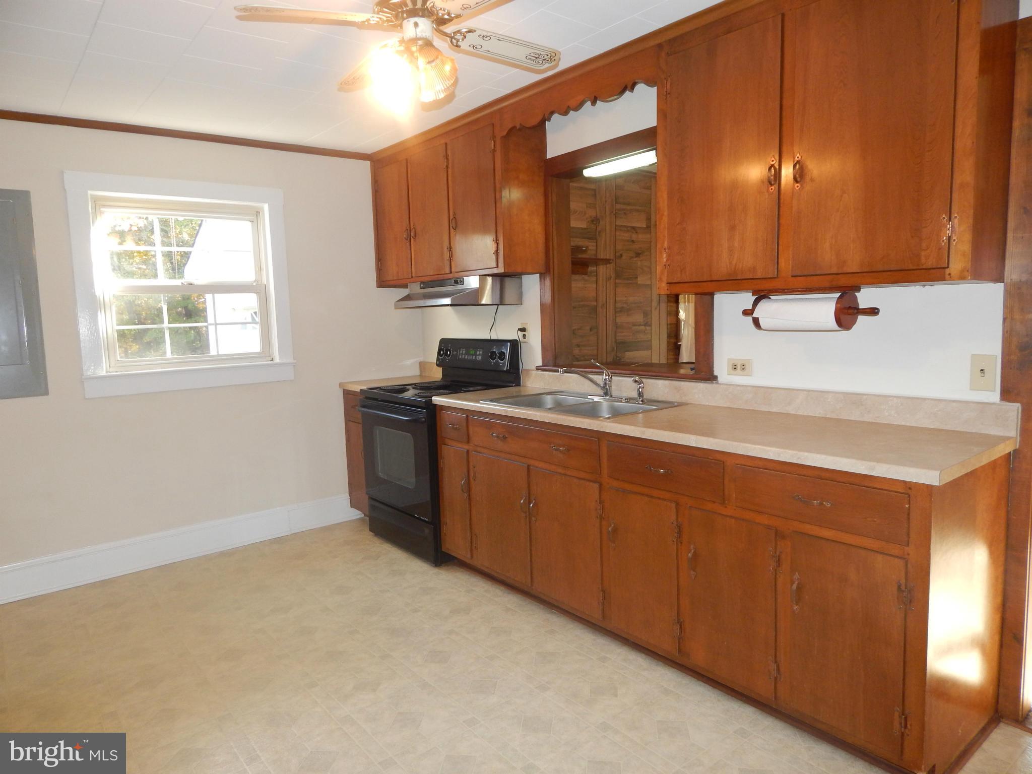 49 Duval Road Mineral, VA 23117 - Photo 12 of 22 a kitchen with stainless steel appliances a sink stove and cabinets
