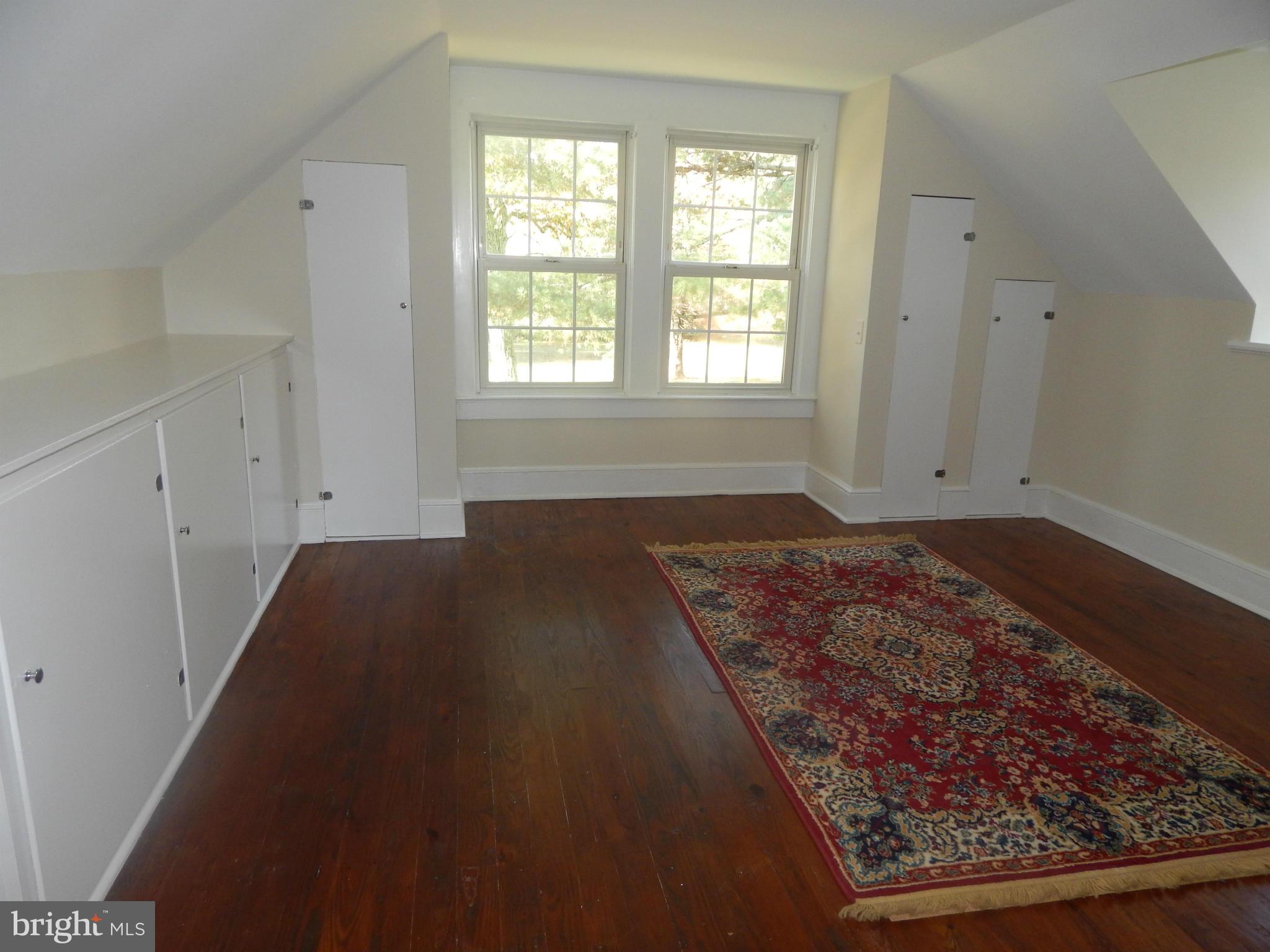 49 Duval Road Mineral, VA 23117 - Photo 14 of 22 a bed sitting in a bedroom next to a window