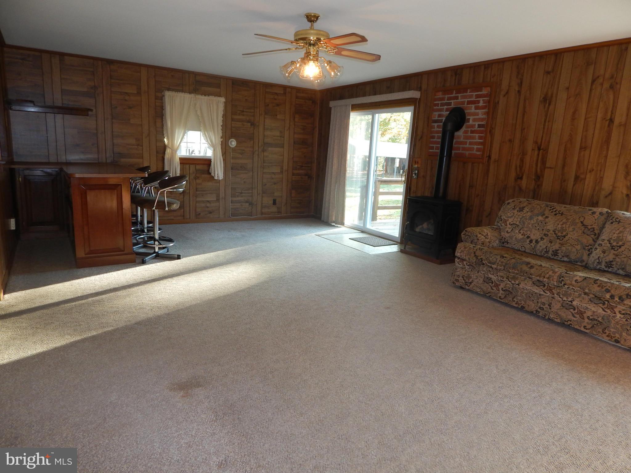 49 Duval Road Mineral, VA 23117 - Photo 4 of 22 a view of livingroom with furniture and chandelier fan