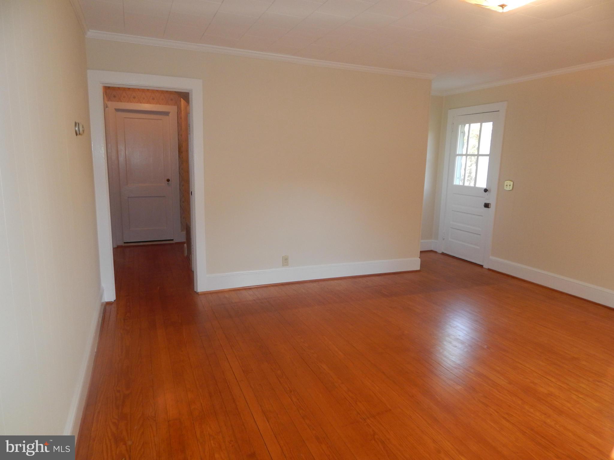 49 Duval Road Mineral, VA 23117 - Photo 10 of 22 an empty room with wooden floor and windows