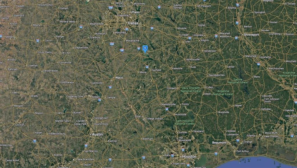 208 Southeast Co Road Kerens, TX 75144 - Photo 5 of 5 a bathroom with a shower and a tiled wall