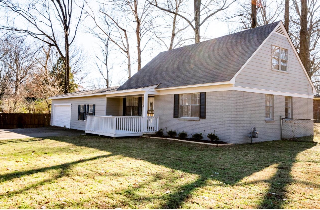 1547 Winfield Road Memphis, TN 38116 - Photo 18 of 20 a view of a house with a yard