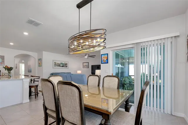 a kitchen that has a lot of fruit on it and wooden floor