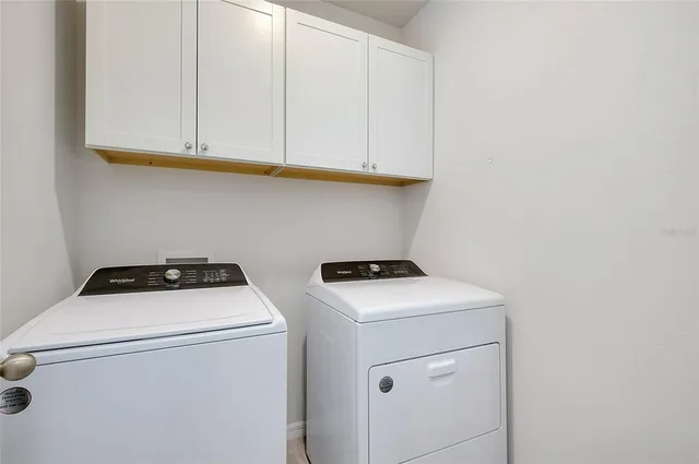 a view of a garage with storage