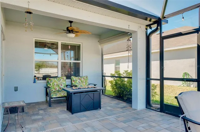 a view of a lake with a sitting area