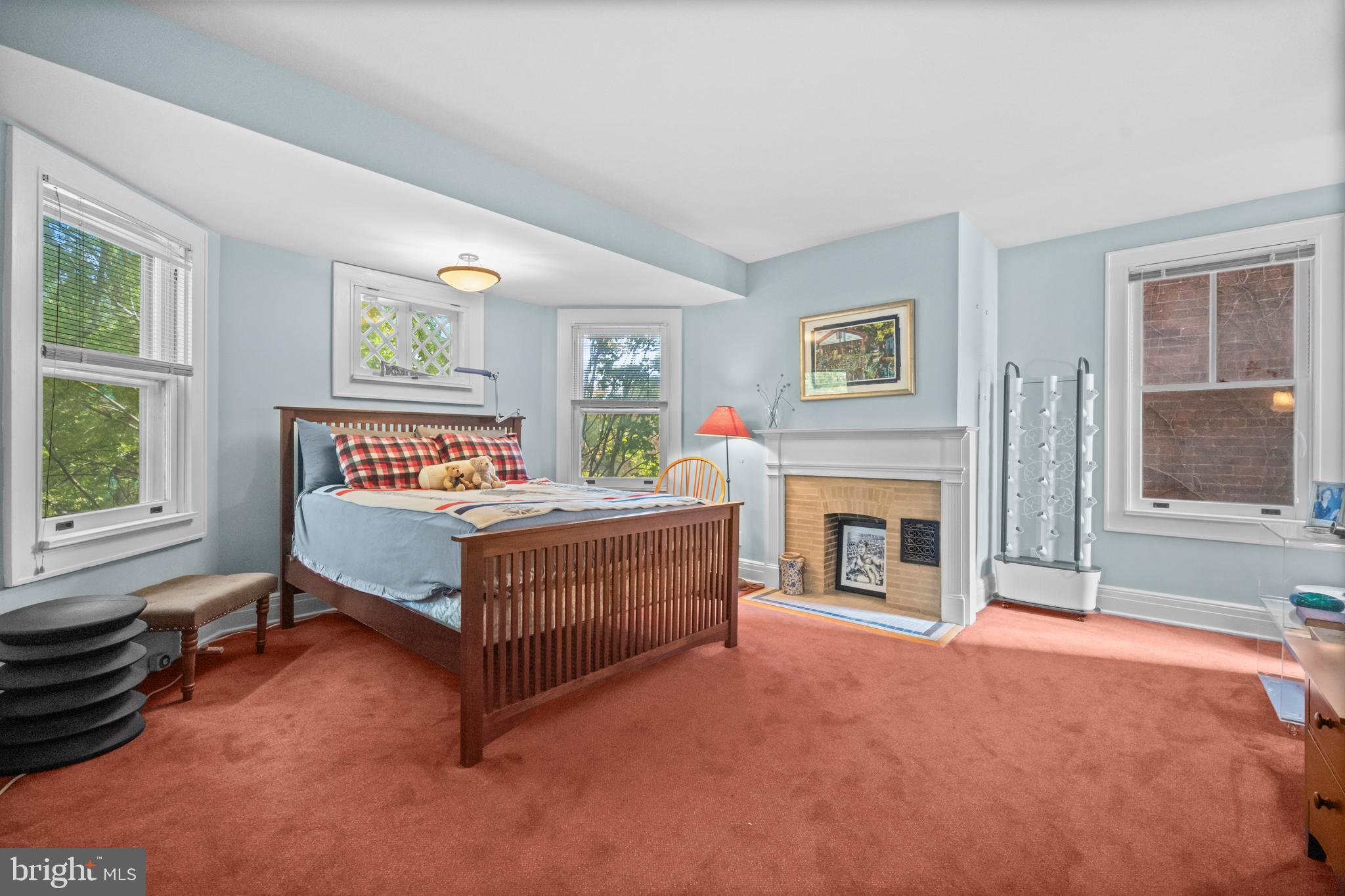 2516 Cliffbourne Place Northwest Washington, DC 20009 - Photo 17 of 34 a bedroom with a bed dresser and a window